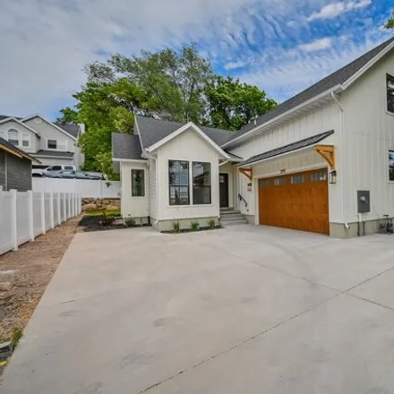 Buy this 4 bed house on 3919 S Holladay Ct E in Holladay, Utah