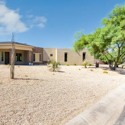 Rent this 4 bed house on North Desierto Drive in Maricopa County, AZ 85263