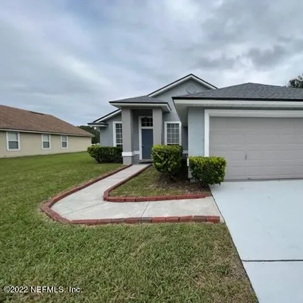 Rent this 4 bed house on 5391 Hidden Gardens Drive in Jacksonville, FL 32258