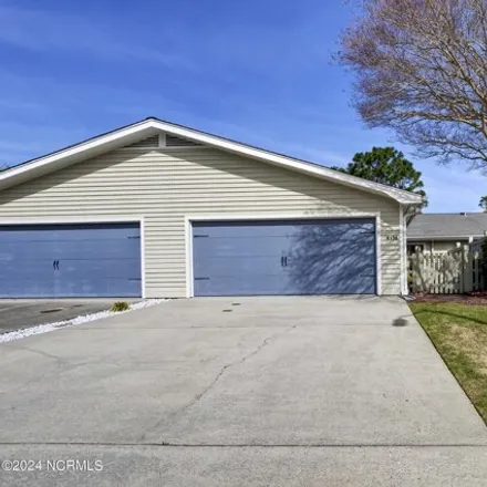 Rent this 2 bed house on 6135 Inland Greens Drive in Long Leaf Acres, Wilmington