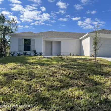 Rent this 3 bed house on 1220 Landau Road Southwest in Palm Bay, FL 32908