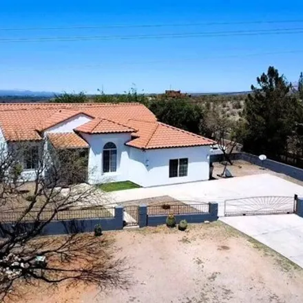 Buy this 4 bed house on 56 Avenida de Las Naciones in Santa Cruz County, AZ 85648