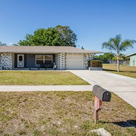 Buy this 4 bed house on 223 Southwest Reynolds Avenue in Port Saint Lucie, FL 34983