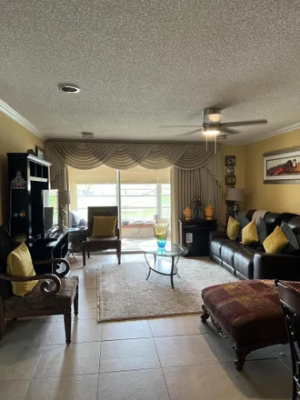 Rent this 2 bed townhouse on 318 Lake Helen Drive in Golden Lakes, Palm Beach County