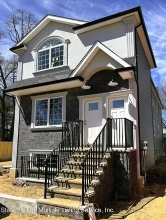 Buy this 6 bed house on 154 Van Name Avenue in New York, NY 10303
