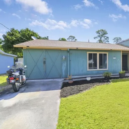 Buy this 3 bed house on 5718 Hickory Drive in Indian River Estates, Saint Lucie County