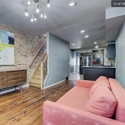 Rent this 2 bed house on 150 North Curley Street in Baltimore, MD 21224