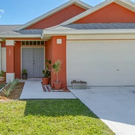 Buy this 3 bed house on 265 Esterbrook Avenue Northeast in Palm Bay, FL 32907