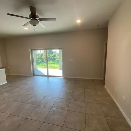 Rent this 3 bed apartment on 18006 Poston Avenue in Port Charlotte, FL 33948