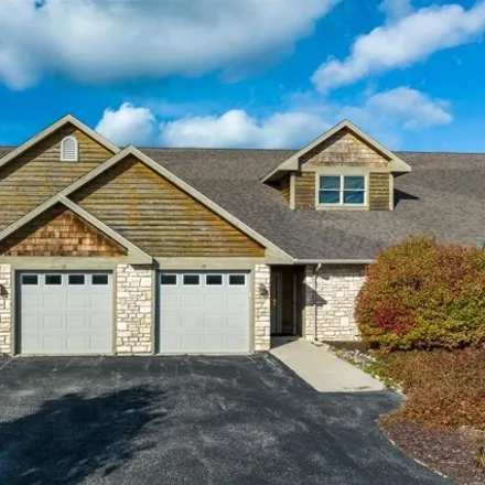 Buy this 3 bed townhouse on Meadow Ridge Road in Egg Harbor, WI 54209