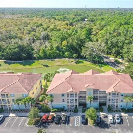 Rent this 3 bed condo on Palm Coast Parkway Northeast in Palm Coast, FL 32137