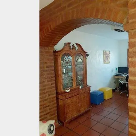 Buy this 4 bed house on 700 - Aviador Plüschow in Partido de Tres de Febrero, 1682 Ciudad Jardín Lomas del Palomar