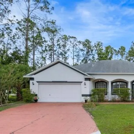 Rent this 3 bed house on 98 Raintree Place in Palm Coast, FL 32164