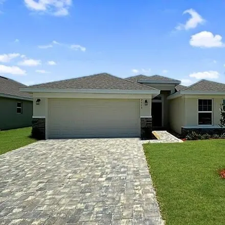 Buy this 4 bed house on 2263 Middlebury Dr SE in Palm Bay, Florida