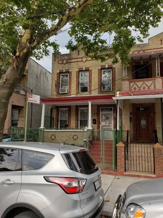 Buy this 6 bed townhouse on 789 Thomas S. Boyland Street in New York, NY 11212