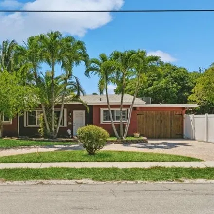 Rent this 3 bed house on 208 West McNab Road in Lyons Park, Pompano Beach