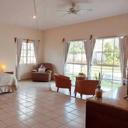 Rent this 4 bed house on 77560 Alfredo V. Bonfil in ROO, Mexico