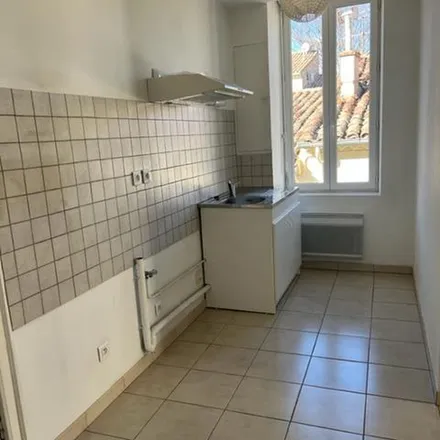 Rent this 2 bed apartment on 1 Place des Arènes in 30000 Nîmes, France