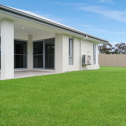 Rent this 4 bed apartment on Rothbury Riot Memorial in Wine Country Drive, NSW 2335