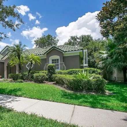 Rent this 4 bed house on 7631 Torino Court in MetroWest, Orlando