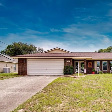 Buy this 3 bed house on 2521 Sedgefield Avenue in Deltona, FL 32725