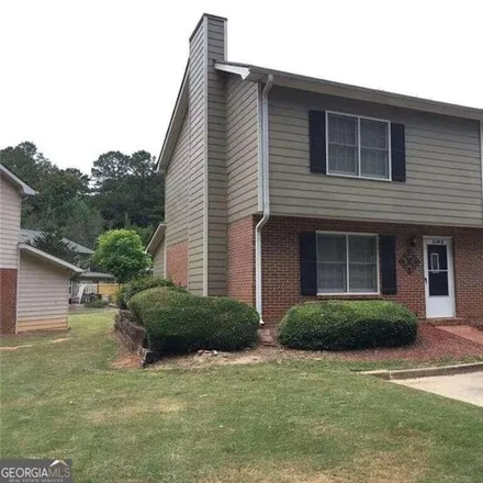Rent this 3 bed house on 2176 Kings Gate Circle Southwest in Snellville, GA 30078