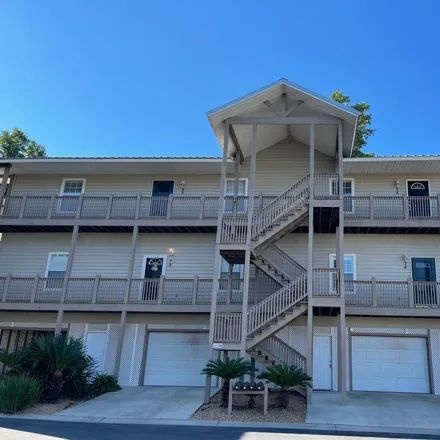 Buy this 3 bed condo on 4 Yacht Club Drive in Park City, Daphne