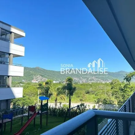 Buy this 2 bed apartment on unnamed road in Cacupé, Florianópolis - SC