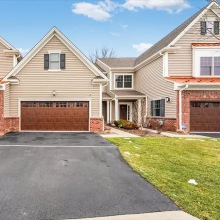 Buy this 2 bed townhouse on Whitney Farm Place in Morris Township, NJ 07960