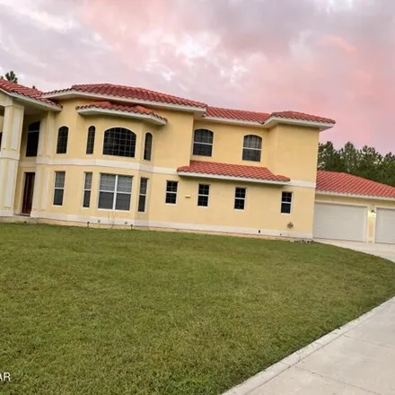 Buy this 5 bed house on 110 Taganana Drive in New Smyrna Beach, FL 32168