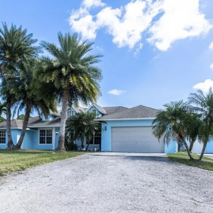 Rent this 3 bed house on 15260 76th Road North in Palm Beach County, FL 33470