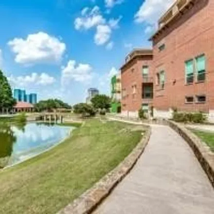 Buy this 3 bed townhouse on 160 Decker Court in Irving, TX 75062