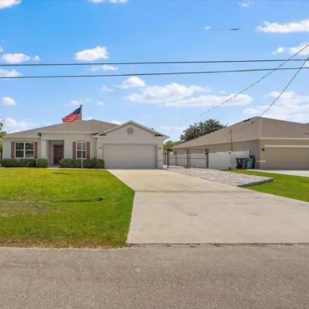 Buy this 4 bed house on 5461 Northwest Crista Street in Port Saint Lucie, FL 34986