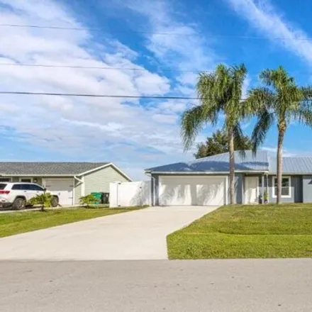 Buy this 3 bed house on 939 Southwest Aviation Avenue in Port Saint Lucie, FL 34953