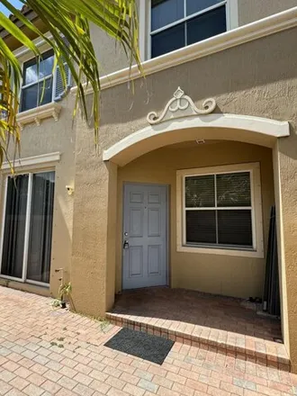 Rent this 2 bed townhouse on Emerald Dunes Club in 2100 Emerald Dunes Drive, West Palm Beach