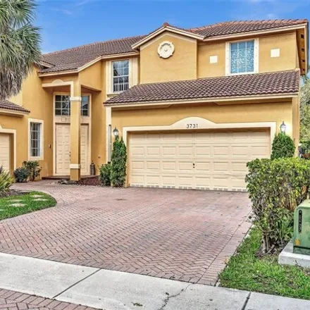 Rent this 5 bed house on 3731 West Gardenia Avenue in Weston, FL 33332