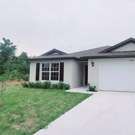 Rent this 4 bed house on 330 Altman Avenue Southeast in Palm Bay, FL 32909