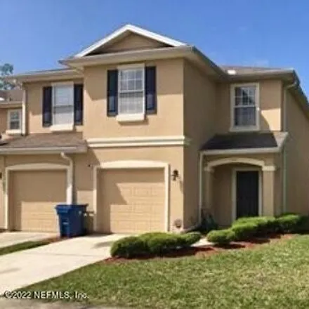 Buy this 3 bed townhouse on Biscayne Bay Circle in Jacksonville, FL 32218