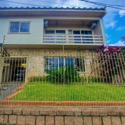 Buy this 3 bed house on Rua Ibirubá in Cavalhada, Porto Alegre - RS