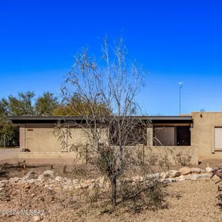 Buy this 4 bed house on 2000 Zarragoza Drive in Pima County, AZ 85704