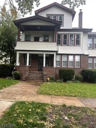 Rent this 3 bed townhouse on 1229 Bergen Street in Newark, NJ 07112