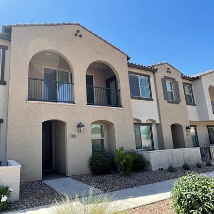 Rent this 3 bed townhouse on 122 North Soho Place in Chandler, AZ 85225