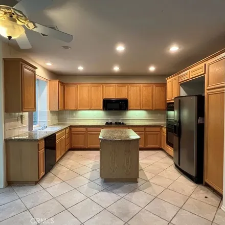 Rent this 4 bed apartment on 11267 Salemo Way in Los Angeles, CA 91326