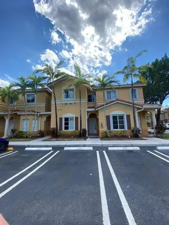 Buy this 4 bed townhouse on 8330 Nw 107th Pl Unit 6-21 in Doral, Florida