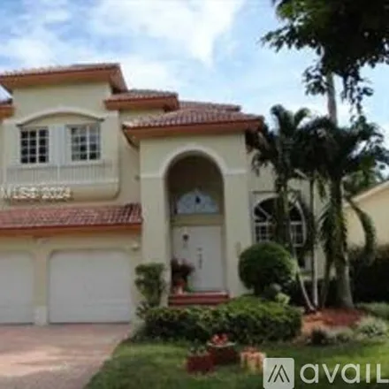 Rent this 4 bed house on 5813 NW 108th Pl