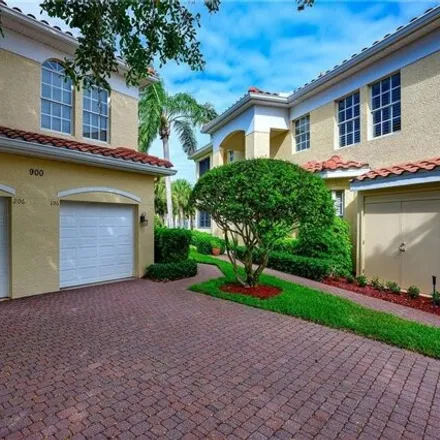 Image 1 - 878 L'Ambiance Circle, Pelican Bay, FL 34108, USA - House for rent