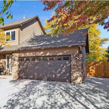 Buy this 4 bed house on 1777 Regatta Drive in Woodbury, MN 55125
