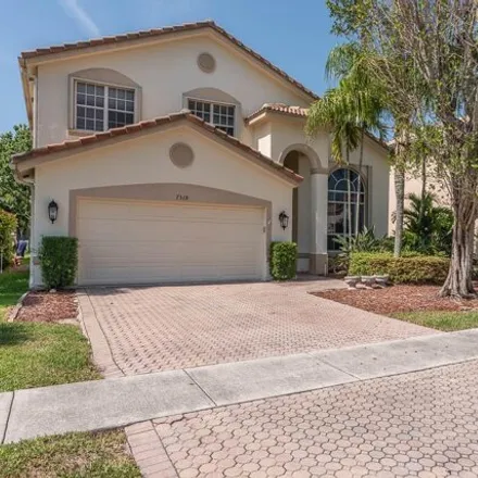 Buy this 4 bed house on 7524 Colony Lake Drive in Palm Beach County, FL 33436