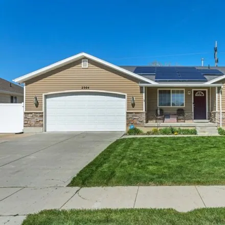 Buy this 6 bed house on 3004 Dove Tail Drive in West Valley City, UT 84128
