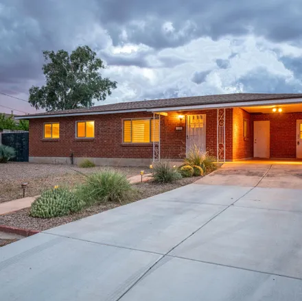 Buy this 3 bed house on 721 North Erin Avenue in Tucson, AZ 85711